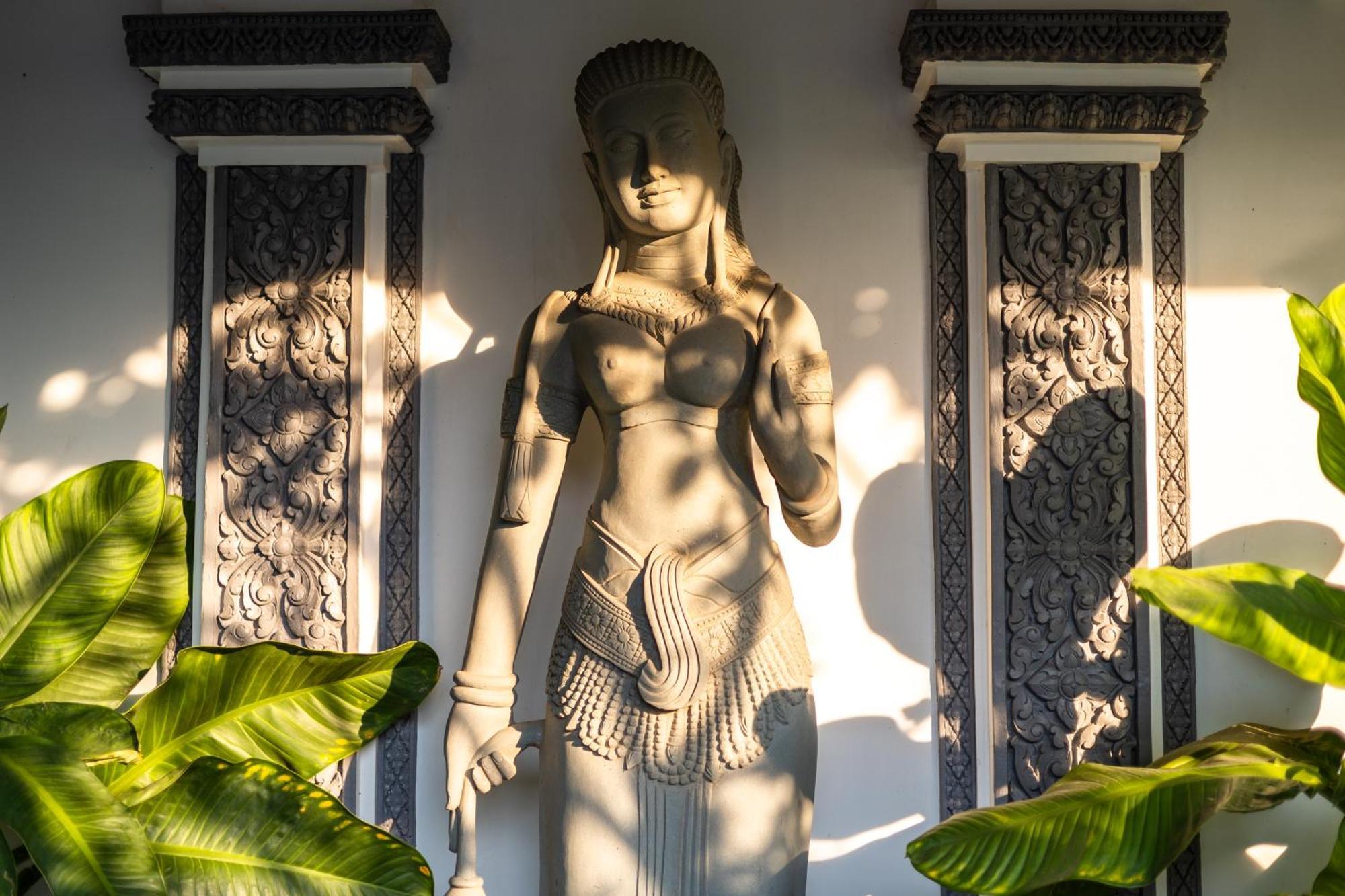 Two Seasons Siem Reap Hotel Экстерьер фото A statue of a female apsara in the Grand Palace, Bangkok, Thailand.